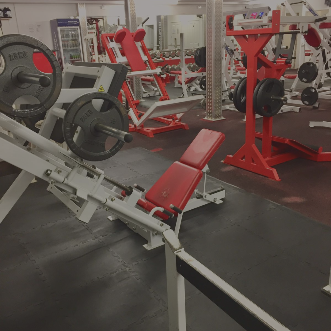 Angle Of Leg press machine and leg equipment In Weight Training Room